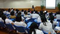 Person presenting about IIPAN to the audience